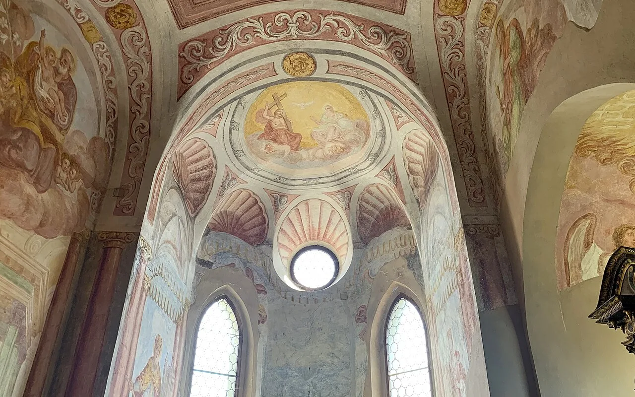 The painted vault and round window of the chapel inside Bled Castle